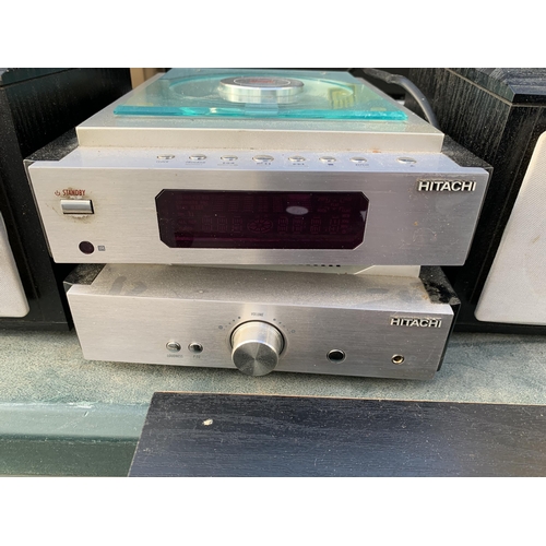 2109 - AN HITACHI STEREO SYSTEM WITH TWO SPEAKERS