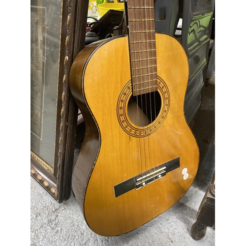 1010A - AN ACOUSTIC GUITAR