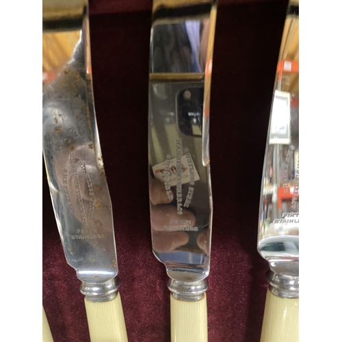 1014 - A VINTAGE MAHOGANY BOXED CANTEEN OF CUTLERY