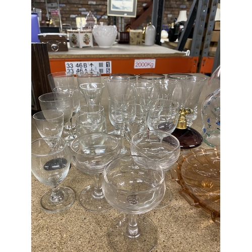 1079 - A LARGE QUANTITY OF VINTAGE GLASSWARE TO INCLUDE BOTTLES, SCENT BOTTLES, GLASSES, ETC