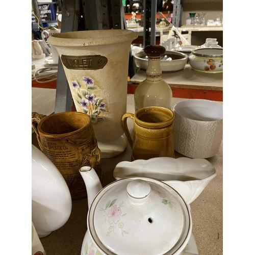 1106 - A QUANTITY OF CERAMIC ITEMS TO INCLUDE VASES, TANKARDS, A TEAPOT, PLANTERS, STORAGE POTS, ETC