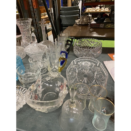 1115 - A LARGE QUANTITY OF GLASSWARE TO INCLUDE VASES, DECANTERS, BOWLS, GLASSES, ETC