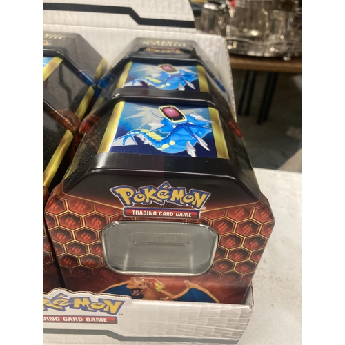 1137 - SIX EMPTY POKEMON TRADING CARD GAME TINS IN HOLDER