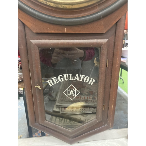 1138 - A MAHOGANY CASED WALL CLOCK WITH PENDULUM 