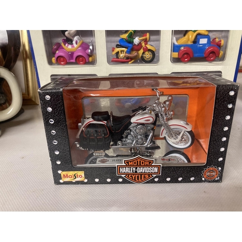 1140 - A MICKEY'S DIE CAST METAL TRANSPORT SET TOGETHER WITH A HARLEY-DAVIDSON MODEL MOTORBIKE