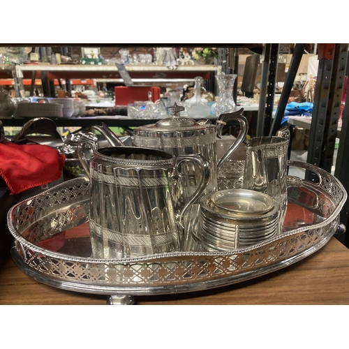 1145 - A SILVER PLATE TRAY WITH TEAPOT, MILK JUG, SUGAR BOWL AND COASTERS