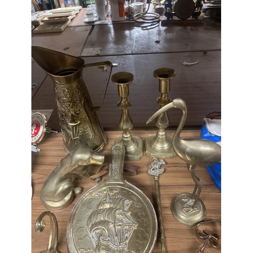 1158 - A QUANTITY OF BRASSWARE TO INCLUDE A JUG, CANDLESTICKS, STORK, DOG, ETC.,