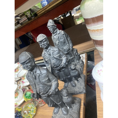 1186 - THREE PLASTER COAL GAMEKEEPER FIGURES TOGETHER WITH DOG FIGURE AND DUCKS