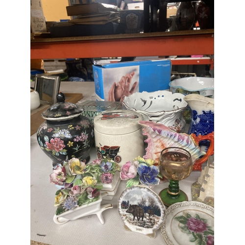 1192 - A LARGE QUANTITY OF COLLECTABLES TO INCLUDE FLOWER POSIES, MILK JUGS, GINGER JAR, PLANTERS, ETC.,