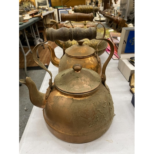 228 - FOUR KETTLES, THREE COPPER AND ONE BRASS