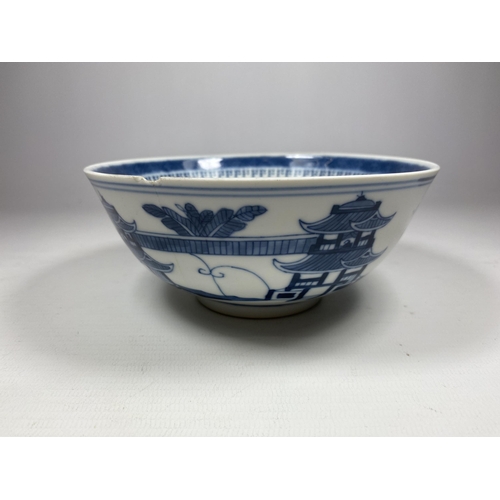 303 - A CHINESE BLUE AND WHITE PORCELAIN BOWL WITH PAGODA DESIGN, UNMARKED TO BASE, DIAMETER 15CM