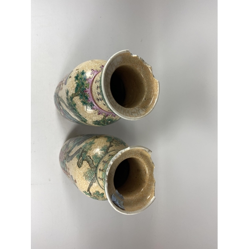 324 - TWO 19TH CENTURY CHINESE CRACKLE GLAZE PORCELAIN WARRIOR DESIGN VASES, HEIGHT 25.5CM (A/F)