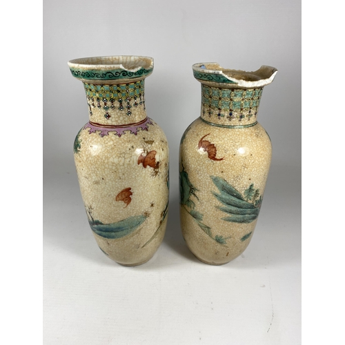 324 - TWO 19TH CENTURY CHINESE CRACKLE GLAZE PORCELAIN WARRIOR DESIGN VASES, HEIGHT 25.5CM (A/F)