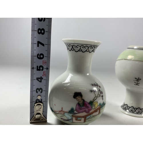 329 - A PAIR OF MINIATURE CHINESE PORCELAIN BOTTLE VASES WITH CALLIGRAPHY DESIGN, HEIGHT 7.5CM