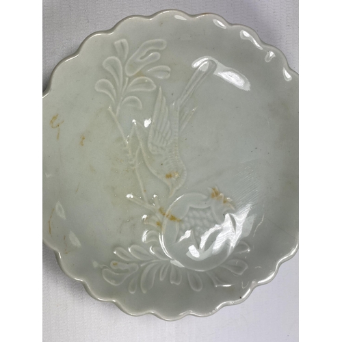 332 - A CHINESE CELADON DISH WITH BIRD & FLORAL DESIGN UNMARKED TO BASE, DIAMETER 11.5CM