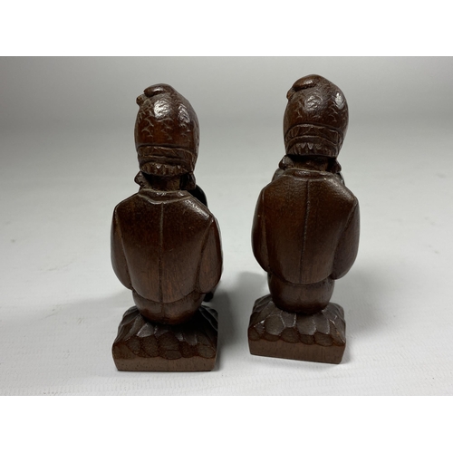 341 - A PAIR OF MINIATURE TRIBAL CARVED WOODEN FIGURES, HEIGHT 9CM