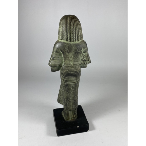 346 - AN EGYPTIAN POTTERY FIGURE ON WOODEN BASE, HEIGHT 27CM