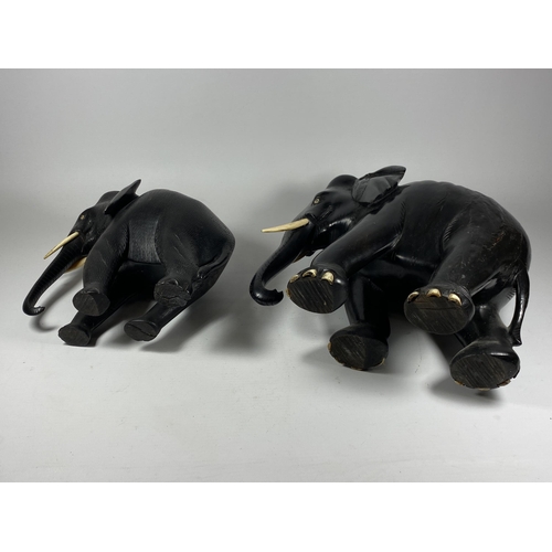 355 - TWO LARGE ANTIQUE EBONY ELEPHANTS, HEIGHT 26CM