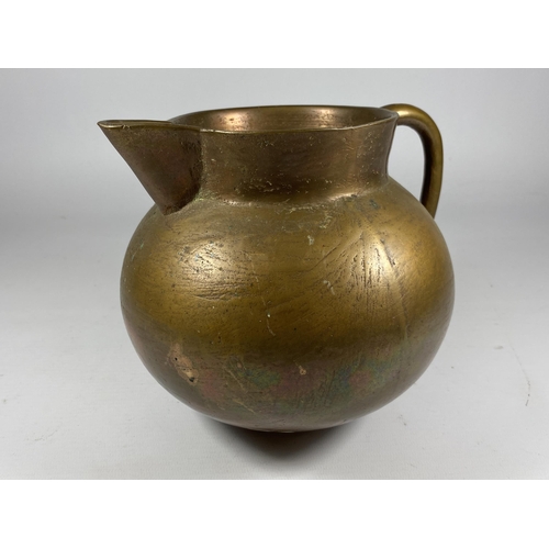 358 - AN UNUSUAL HEAVY BRASS JUG OF SPHERICAL BASE, HEIGHT 16CM