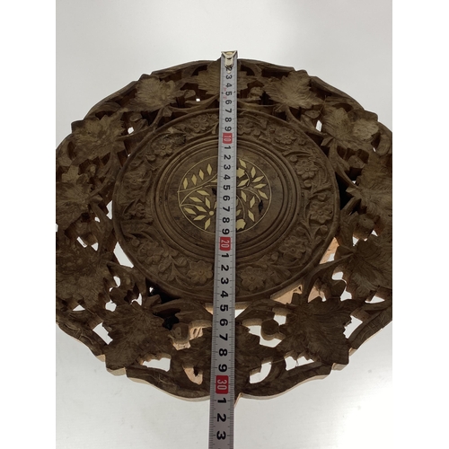 360 - A CAVRED TRIBAL TRIPOD TABLE, HEIGHT 32CM