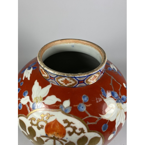 364 - A LARGE JAPANESE MEIJI PERIOD (1868-1912) OVOID FORM WITH RED ENAMEL AND FLORAL DESIGN, HEIGHT 24CM