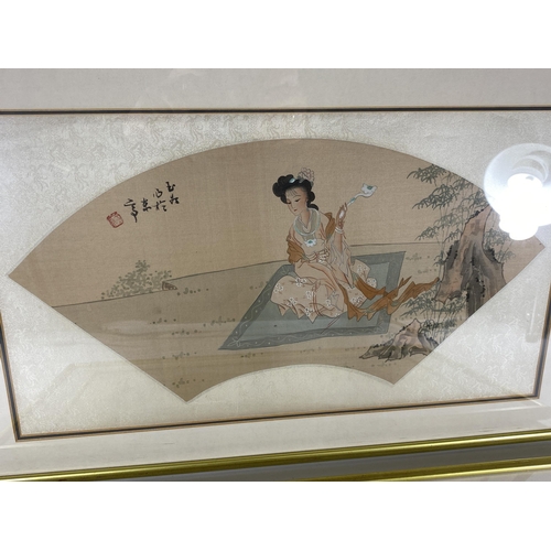 383 - A PAIR OF GILT FRAMED CHINESE SILK FAN PICTURES, 55 X 35CM