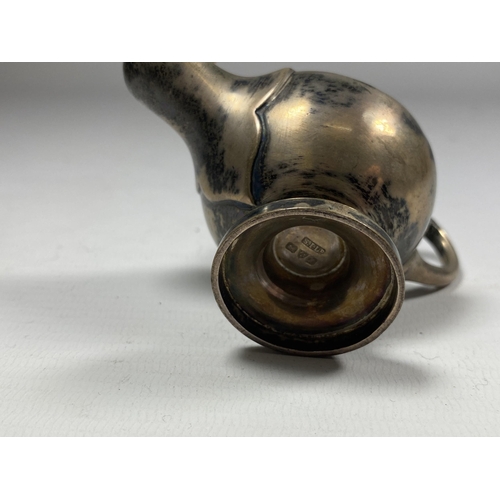 16 - A CHESTER HALLMARKED SILVER MINIATURE GENIE'S LAMP, LENGTH 9CM