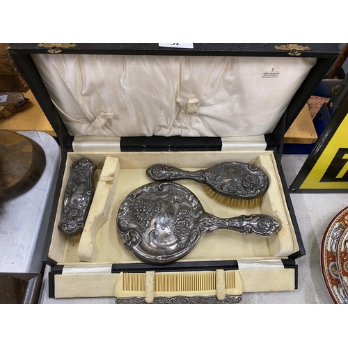 32 - A CASED HOPE SILVER CO SILVER BACKED DRESSING TABLE SET