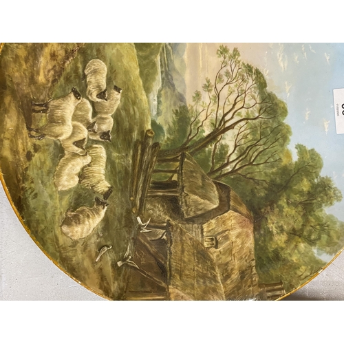 66 - A HANDPAINTED COPELAND WALL CHARGER WITH AN IMAGE OF SHEEP - DIAMETER 31CM