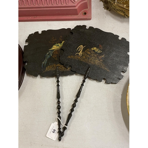 68 - A PAIR OF ORIENTAL LACQUERED HAND FANS