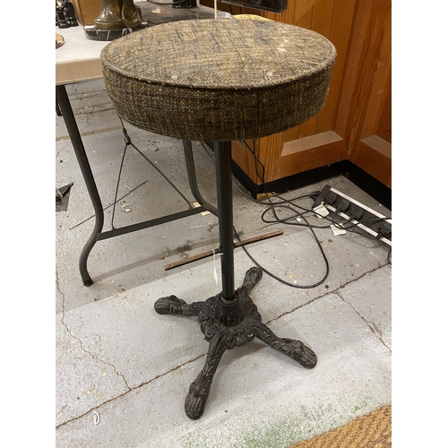 78 - A CIRCULAR TOPPED BARSTOOL WITH CAST METAL BASE WITH PAW FEET