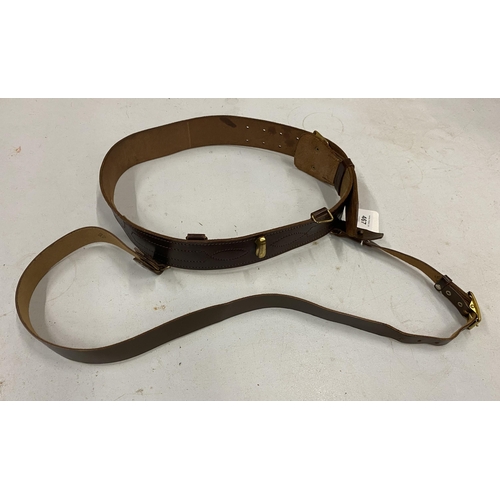 467 - A LEATHER SAM BROWNE BELT AND SHOULDER STRAP