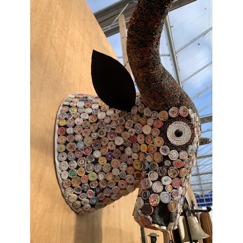 A WALL MOUNTED BULLS HEAD CONSTRUCTED FROM PAPER STRAWS