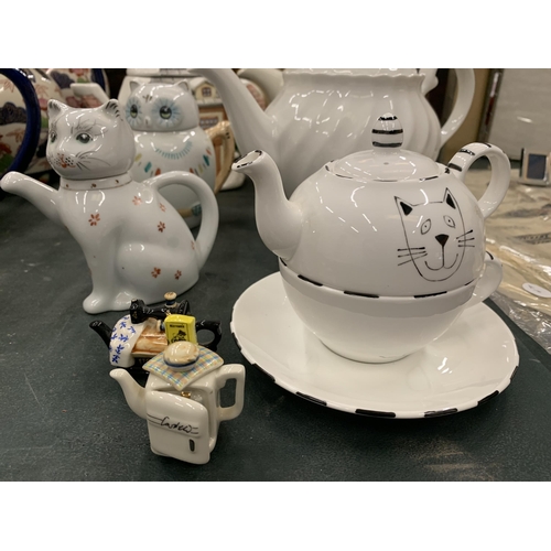 114 - A COLLECTION OF TEAPOTS TO INCLUDE A TONY WOOD GOLF TEAPOT, CAT AND OWL THEMED, A VICKY PRICE CAT TE... 