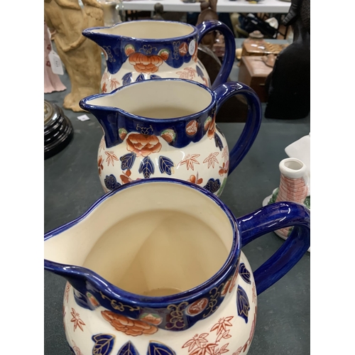 116 - A GRADUATED SET OF FIVE 'VICTORIA' IRONSTONE JUGS