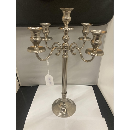 140 - A HEAVY WHITE METAL FIVE BRANCHED CANDLEABRA HEIGHT 52CM