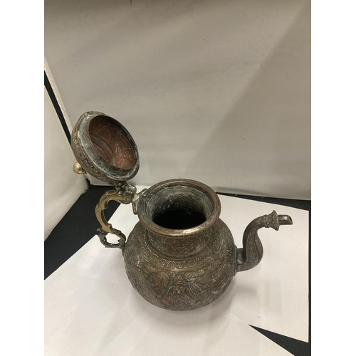 143 - AN ASIAN STYLE COPPER TEAPOT WITH EMBOSSED DESIGN
