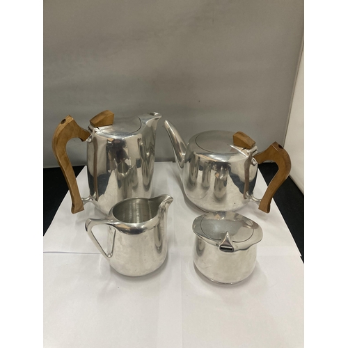 145 - A PICQUOT WARE STAINLESS STEEL TEAPOT, COFFEE POT, SUGAR BOWL AND CREAM JUG