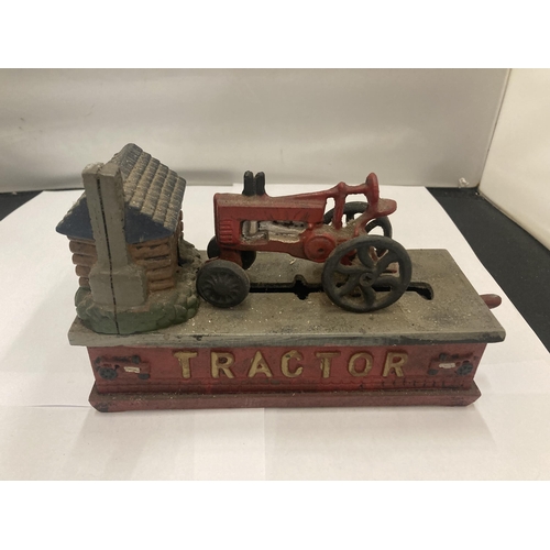 148 - A VINTAGE STYLE CAST TRACTOR MONEY BANK