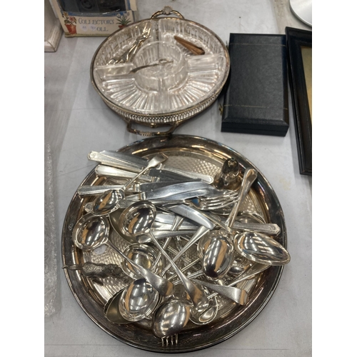 151 - A GLASS NIBBLES DISH WITH SILVER PLATED BASE, TRAY AND A QUANTITY OF VINTAGE FLATWARE TO INCLUDE KNI... 