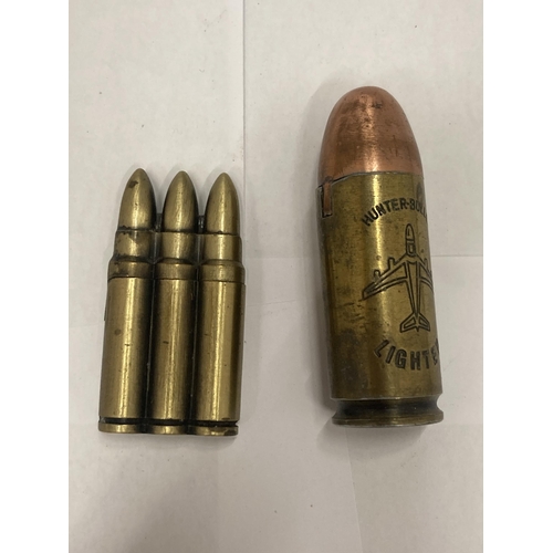 155 - TWO NOVELTY LIGHTERS IN THE FORM OF BULLETS