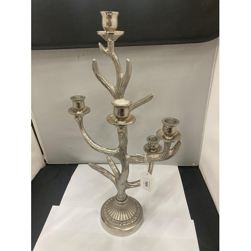 164 - A METAL FIVE BRANCH CANDLEABRA IN THE FORM OF AN ANTLER HEIGHT APPROX 52CM