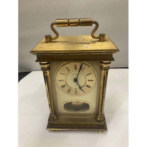 175 - A BRASS EIGHT DAY CARRIAGE CLOCK