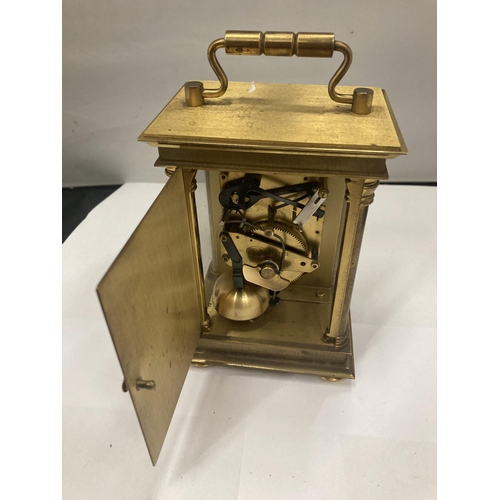 175 - A BRASS EIGHT DAY CARRIAGE CLOCK