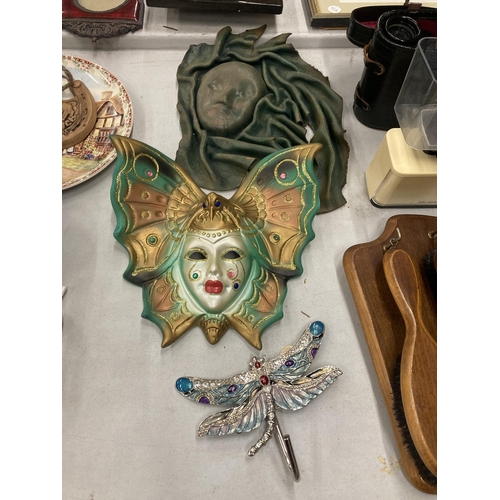 188 - A PORCELAIN BUTTERFLY LADY MASK, LEATHER LADY PLAQUE AND DRAGONFLY HOOK