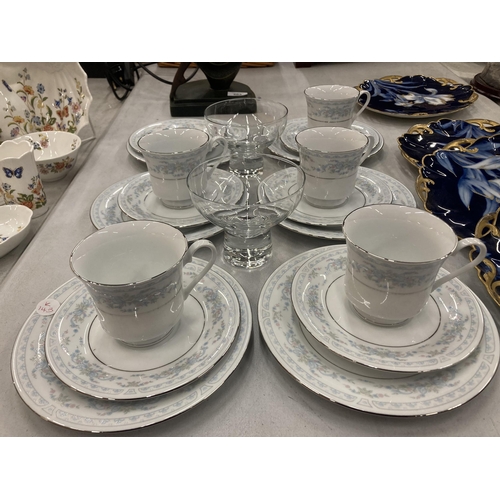 202 - A QUANTITY OF CROWN MING CHINA CUPS, SAUCERS AND SIDE PLATES PLUS TWO GLASS DESSERT BOWLS