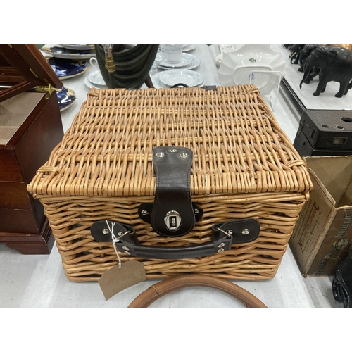 234 - A PICNIC BASKET TO INCLUDE ACCESSORIES