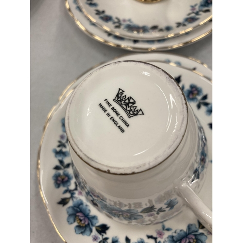 255 - A QUANTITY OF CHINA CUPS AND SAUCERS PLUS A SUGAR BOWL