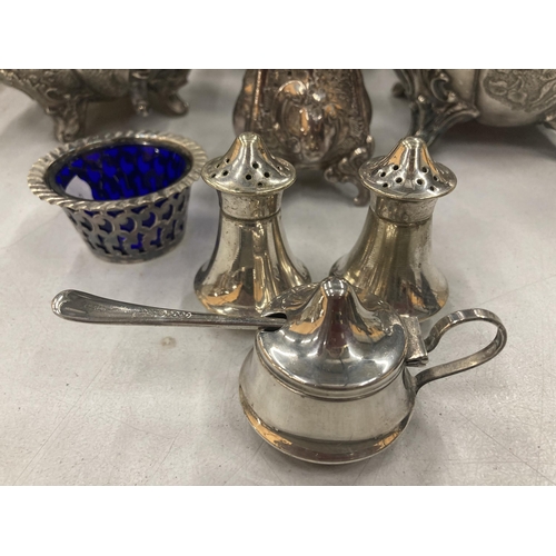 257 - A LARGE QUANTITY OF SILVER PLATED ITEMS TO INCLUDE A COFFEE POT, TEAPOT AND SUGAR BASIN WITH EMBOSSE... 