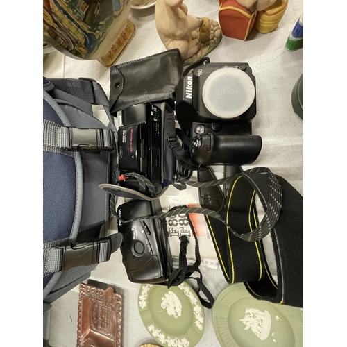 300 - A QUANTITY OF CAMERAS TO INCLUDE A NIKON F80, MINOLTA AUTOFLASH, PANORAMA WIDE PIC, TWO WITH CASES P... 